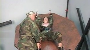 Restrained soldier girl gets her tits bared and nips tortured by master